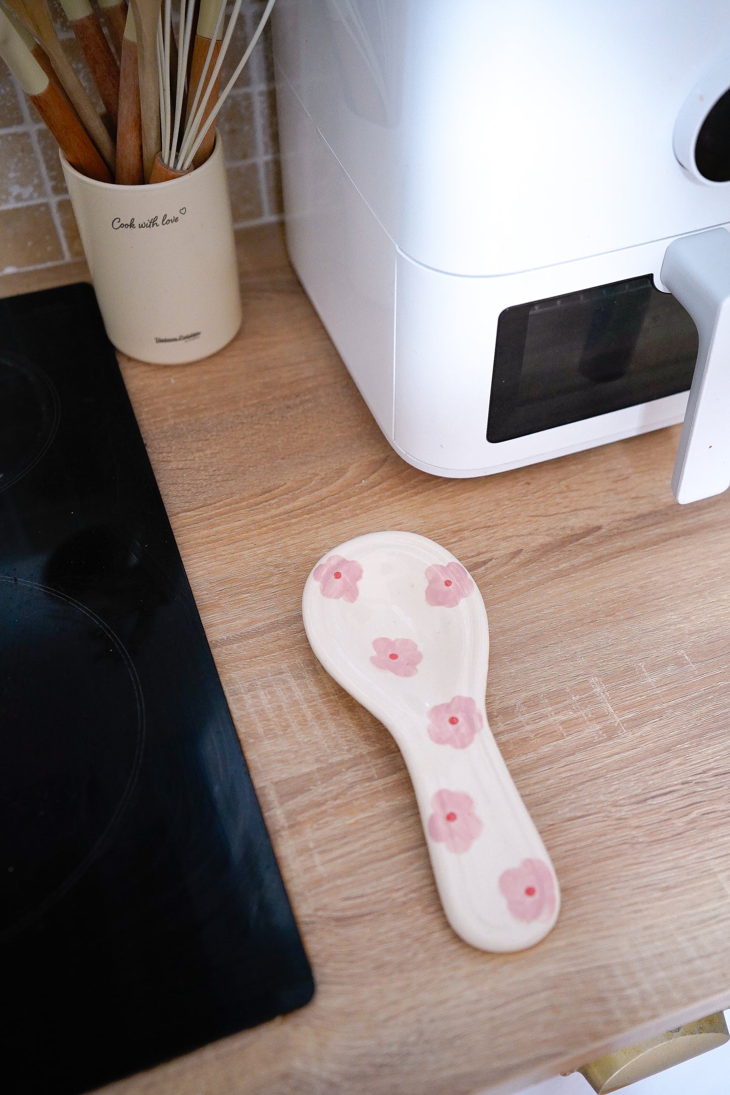 Repose-cuillère à fleurs