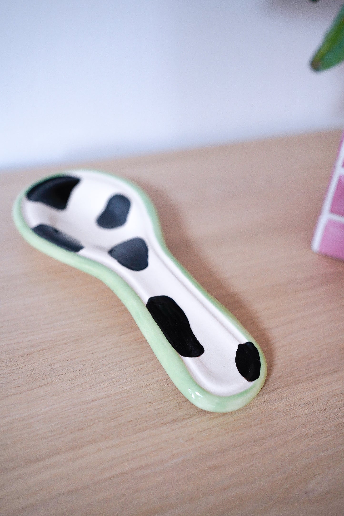 Repose-cuillère cow green