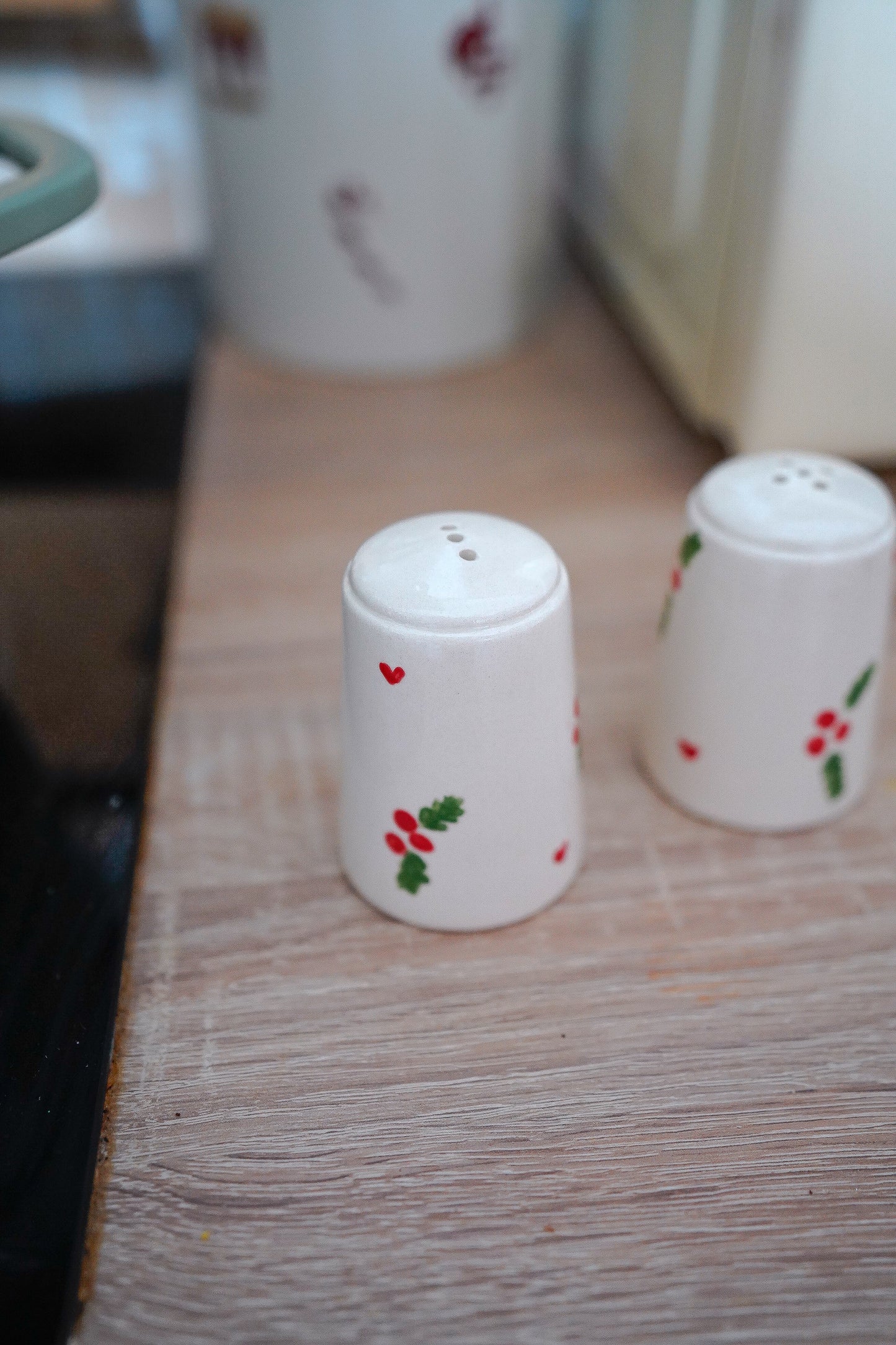 Salière et poivrière de Noël Houx