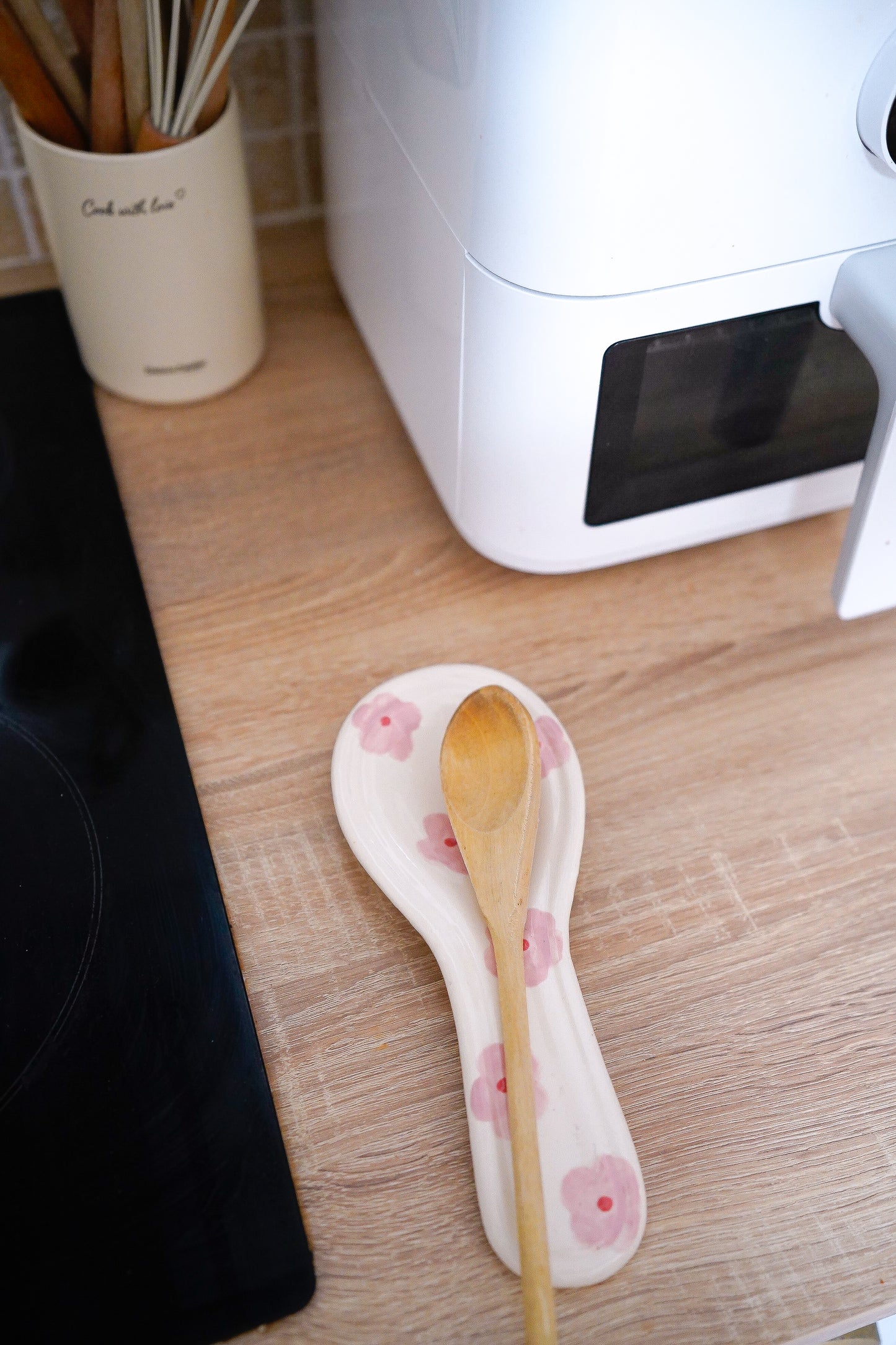 Repose-cuillère à fleurs