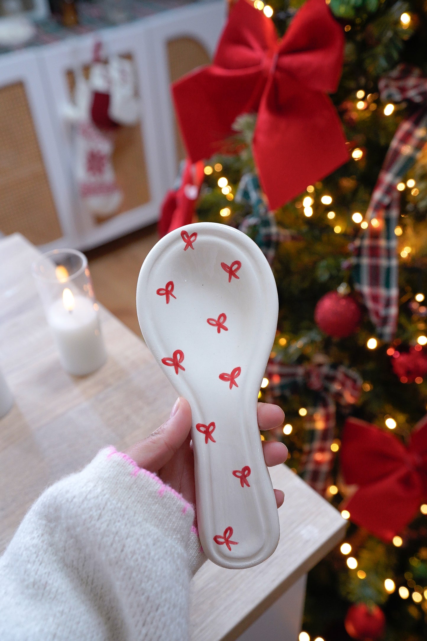 Repose-cuillère Noël nœuds rouges