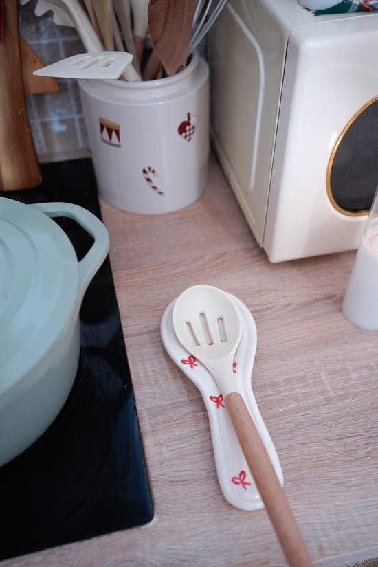 Repose-cuillère Noël nœuds rouges