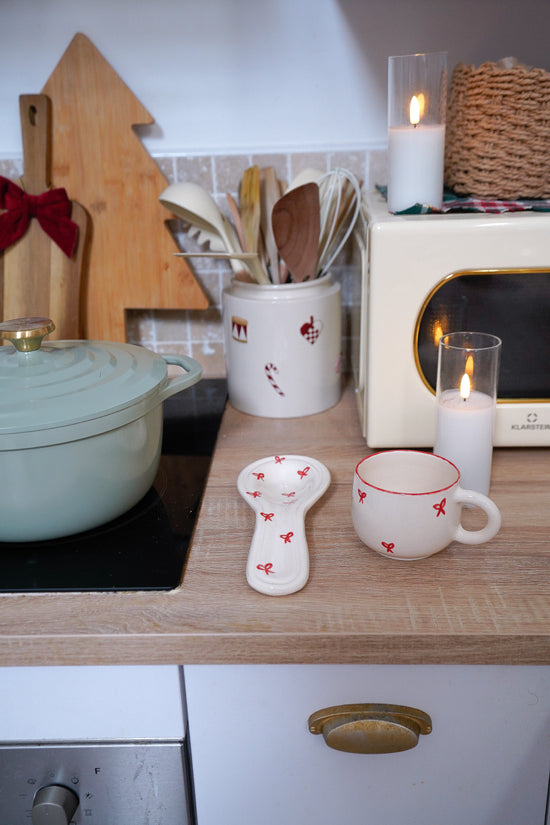 Repose-cuillère Noël nœuds rouges